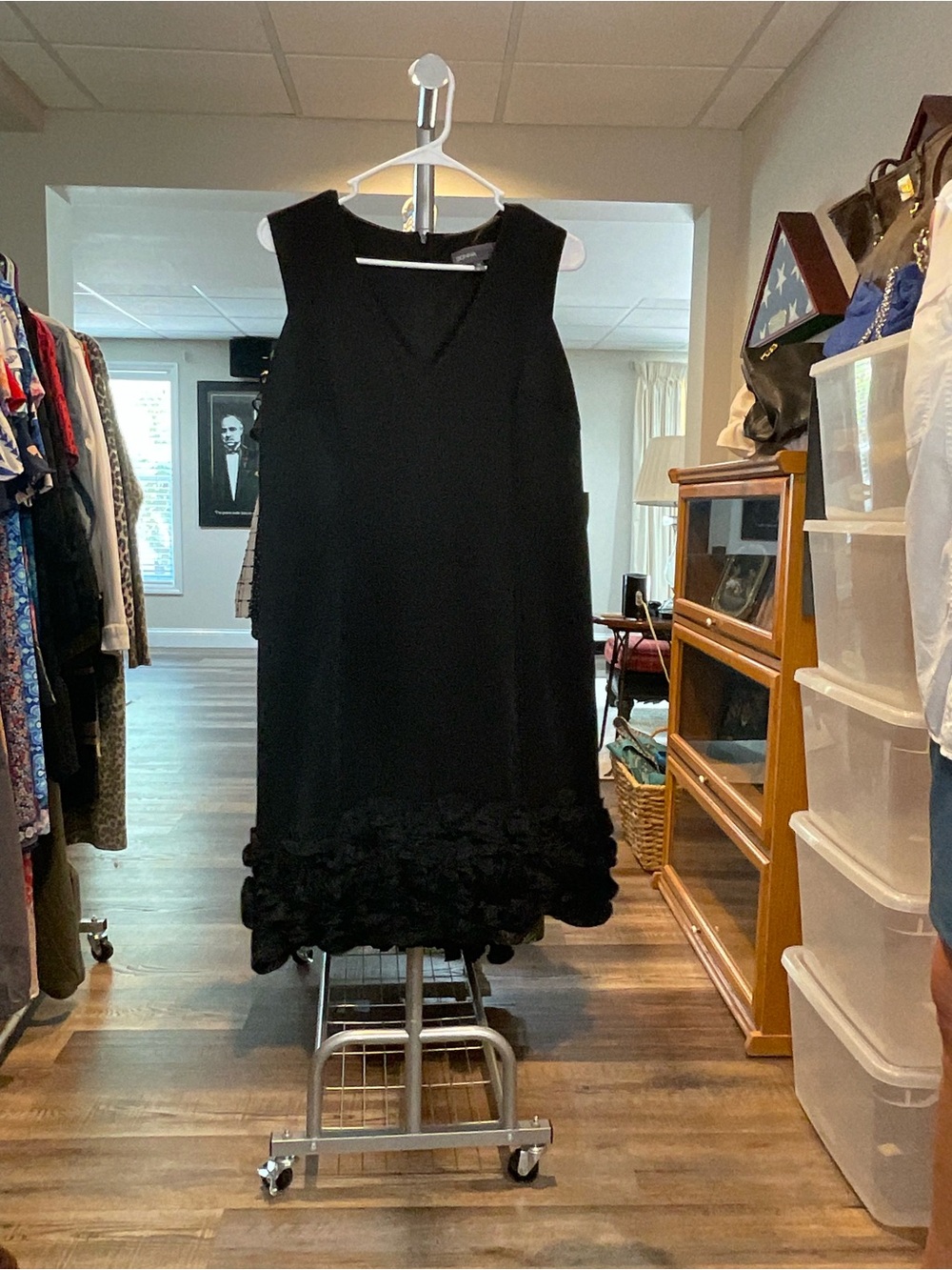 Donna Ricco Black Sleeveless Dress with Rosette Hem